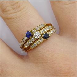 18ct gold diamond and sapphire trinity ring, the central row set with diamonds, the outer two rows set with sapphires and diamonds