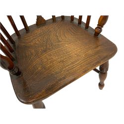 19th century elm and yew child's Windsor chair, low hoop stick back with pierced splat, dished seat raised on ring turned supports joined by crinoline stretcher