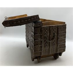 19th century Eastern dowry chest with copper banding and studs over punched decoration with twin handles and raised on wheels L42cm H35cm