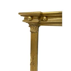 Regency style giltwood overmantel mirror, moulded projecting cornice with applied ball decoration, bevelled mirror plate flanked by fluted columns with Corinthian capitals 