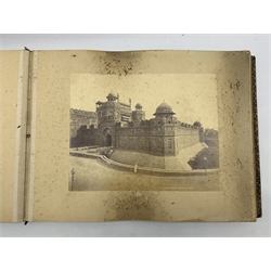 Album containing approximately fifty albumen prints of India, with 'Bourne & Shepherd, Calcutta, Simla & Bombay' purple stamp to the inside, initialled monogram cartouche and gilt border decoration to the front