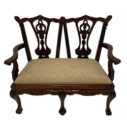 Miniature Chippendale design mahogany double seat, pierced and carved back decorated with bell-flowers, scrolls and acanthus leaves, raised on cabriole supports with ball and claw feet