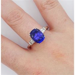 18ct gold cushion cut tanzanite ring, with tapered baguette cut diamond shoulders, hallmarked, tanzanite approx 3.90 carat