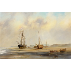 David C Bell (British 1950-): 'A Yorkshire Coastal Scene' - Vessels at Low Tide, oil on canvas signed, titled verso on gallery label 50cm x 75cm 
Provenance: with James Starkey Galleries, Beverley, label verso
DDS - Artist's resale rights may apply to this lot 