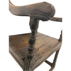 17th century carved oak Wainscot chair, the back with two carved rails over a twin panelled back, the rails decorated with faintly carved chevrons, downswept arms with turned supports, the panelled seat over ring turned front supports united by box stretcher