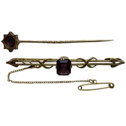 Purple paste bar brooch, stamped 9ct, and a ruby stick pin (2)