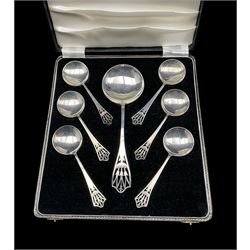 Cased set of Art Deco silver comprising six dessert spoons and serving spoon with pierced finials Birmingham 1920 Maker Lanson Ltd  7oz