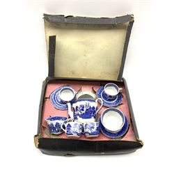 Early 20th century Ridgway & Co. Semi China childs Willow pattern blue and white tea set comprising four cups and saucers, two plates, tea pot, milk jug and sugar bowl in the remains of the original box