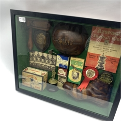 Montage of football items including Arsenal programme 1950, wooden rattle, whistle etc in a glazed case, 60cm x 50cm 