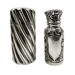 Victorian silver cylindrical scent flask of spiral design with hinged cover and interior glass stopper H5.5cm London 1894 Maker Sampson Mordan & Co and another chased with flowers H5cm Chester 1896 Maker Henry Griffith (2)