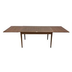 Mid-20th century teak extending draw-leaf dining table, raised on cylindrical tapering supports