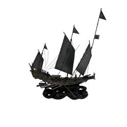 Chinese white metal Junk ship on carved wooden stand, with textured sails, 