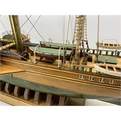 Scratch built ship model of P.S. Sirius, raised upon oak base with plaque 'City of Cork Steam Packet Co., P.S 'Sirius' 1837, The First Ship To Cross The Atlantic, Under Continuous Steam Power', L99cm x H62cm, together with two framed prints relating to Sirius (3)
