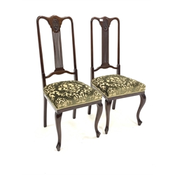 Pair early 20th century mahogany side chairs with serpentine cresting rail and pierced splat over upholstered seats, raised on cabriole front supports, W45cm