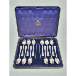 Set of twelve silver tea spoons and tongs, monogrammed and with decorative stems Sheffield 1905 Maker Lee and Wigfull, cased 6.7oz