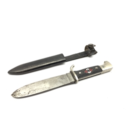 German Third Reich Hitler Youth knife, the 13.5cm blade stamped 'RZM M7/11 1941', nickel plated hilt and black plastic grip inset with enamelled badge in steel scabbard with leather strap 