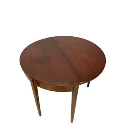 George III mahogany demi lune tea table, the fold over top, raised on square tapering supports 