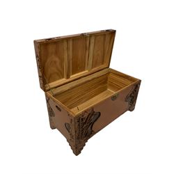 Carved camphor wood blanket box with oriental carved scenes 