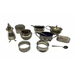 Silver three piece condiment set Birmingham 1938, two other silver salts, three silver serviette rings and an Eastern white metal box weighable silver approx 5.5oz