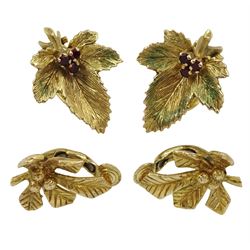 Two pairs of gold leaf clip on earrings, one pair set with garnets, both 9ct hallmarked or tested