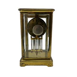 An early 20th century French Four Glass clock of small proportions c1910, with an eight-day striking movement , striking the hours on a bell, with an enamel dial with upright Arabic numerals and quarter hour minutes, minute track, steel moon hands, decorated with garland swags of flowers, twin file faux mercury pendulum.





