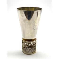  Elizabeth II silver and silver gilt goblet by Stuart Devlin with tapering bowl and pierced base H15cm London 1967    