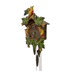 German - 1960’s 30-hour musical cuckoo clock, with with applied coloured and carved detail to the case, traditional dial and hands with cuckoo and automata figure, three-train chain driven movement sounding the hours and half hours with a cuckoo call and coiled gong.
With weights and pendulum.