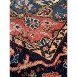  Persian hand knotted cream ground rug, with lozenge medallion surrounded by interlaced foliate, guarded border, 106cm x 171cm  