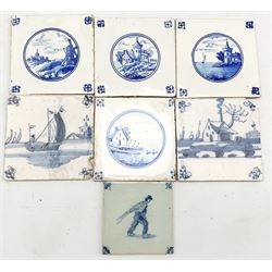 Group of assorted Delft tiles to include a set of three painted in roundels with buildings and landscapes, 13cm x 13cm approx, another similar tile, a matched pair decorated with a sailing boat and a house and one other (7)