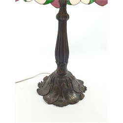 Tiffany style table lamp, leaded glass shade on lily pad moulded cast metal support, H69cm 