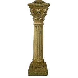 Composite stone bust, modelled after Michelangelo's David, on a Corinthian column pedestal