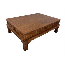 Chinese Imperial style hardwood throne room rectangular tea table, panelled rectangular form, carved with foliate motifs and trailing geometric patterns, on square supports
