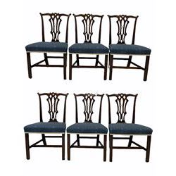 Set six Georgian mahogany dining chairs, Chippendale design, shaped cresting rails relief carved with foliate motifs over Gothic type pierced splats, over stuffed upholstered seats in blue fabric, square front supports with inner chamfer joined by plain stretchers, seat width - 56cm, seat height - 49cm, total height - 97cm