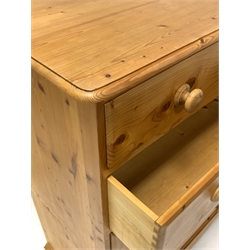 Polished pine chest, two short and four long drawers