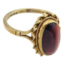 9ct gold single stone cabochon garnet ring, with rope twist surround, hallmarked