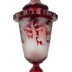 19th century Bohemian ruby overlay glass goblet vase and cover, the funnel shaped bowl wheel engraved with a leaping Stag and Deer in a woodland landscape, hexagonal ruby glass cover with knopped finial, the bowl supported by a faceted baluster stem and shaped circular foot, the cover and foot each engraved with fruiting vines, H44cm overall, vase H28cm, bowl D11cm 