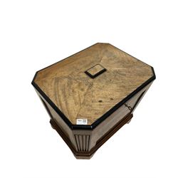 Regency mahogany and ebonised cellaret, early 19th century, the hinged lid enclosing a divided lead interior, with canted and fluted sides 