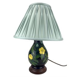 Moorcroft Buttercup pattern table lamp with pleated shade on wooden base H21cm excluding fittings