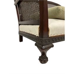 Early to mid-20th century walnut framed three seat settee, shaped back with three canework panels, the scrolled arms carved with acanthus leaves, sprung seat over moulded frieze decorated with Greek key design, raised on ogee cabriole supports with ball and claw feet