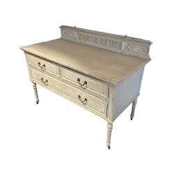 Early 20th century French dressing chest, rectangular top with egg and dart moulded lower edge, fitted with two short and one long mahogany lined drawer, raised on turned fluted supports on castors