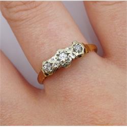 18ct gold three stone diamond ring, stamped 750