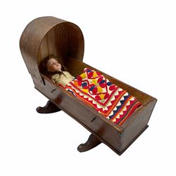 Armand Marseille bisque head doll with sleeping eyes, open mouth and kid body H38cm, in a canopied wooden crib