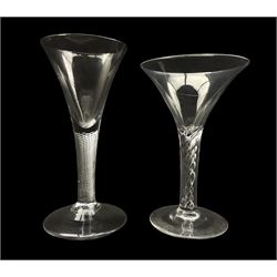 Two 19th/ early 20th century wine glasses, both having air twist stems with trumpet bowls, H18.5cm, 19th century Bohemian cut glass goblet applied with an oval painted portrait of Jesus Christ within a jewelled border flanked by the initials H. F. H14cm together with a similar style tumbler with engraved decoration (4)