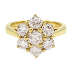 18ct gold seven stone round brilliant cut diamond daisy cluster ring, stamped 750, total diamond weight 2.17 carat