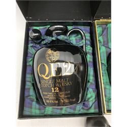 Q.E.2 single malt Scotch whisky, over twelve years old, bottled by Beinn Bhuidhe Holdings for Cunard in black ceramic flagon with wax seal and stopper,  75cl 48.6% Vol, in presentation box, another and a miniature flagon (3)