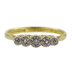 Early 20th century illusion set five stone diamond ring, with scroll design gallery, stamped 18ct PT