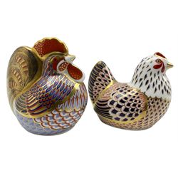 Two Royal Crown Derby paperweights comprising a Cockerel and Hen dated 1994 and 1995 (2)