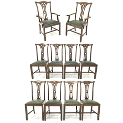 Set of ten (8 + 2) early 20th century Georgian style mahogany dining chairs, shaped and leaf carved cresting rail over pierced splat, drop in leather upholstered seat pad, raised on moulded square supports 