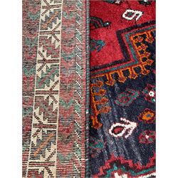 Persian Afshar rug, the red and navy border enclosed by an ivory border 210cm x 151cm
