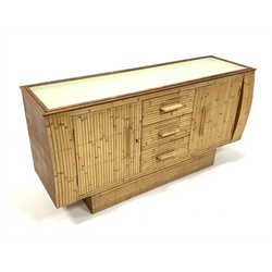 Angraves - Mid century oak and split bamboo sideboard, with glazed top over two cupboards and three drawers, raised on pedestal base, bearing ivorine plaque to reverse, Circa 1950s W155cm, H78cm, D49cm